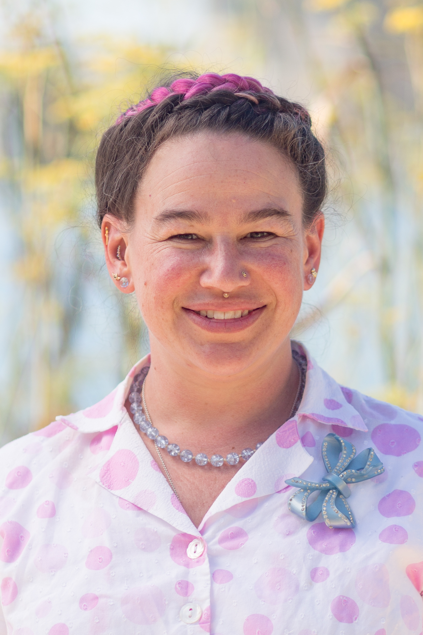 A close-up portrait of Bike East Bay staff member