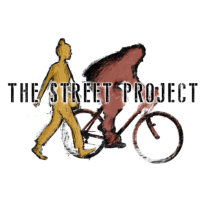 "The Street Project" film logo, text on top of a silhouette of a person biking and a person walking