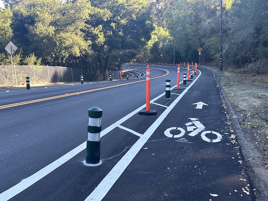 Photo of a flex post-protected bikeway on Campus Dr in Hayward