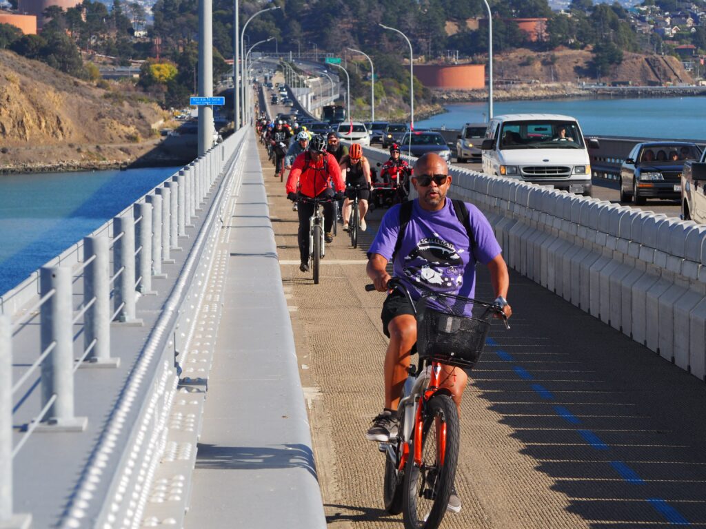 Photo of people on bikes crossing the Richmond-San Rafael Bridge Trail