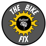 "The Bike Fix, Oakland Library" logo illustration with a bicycle gear and wrench