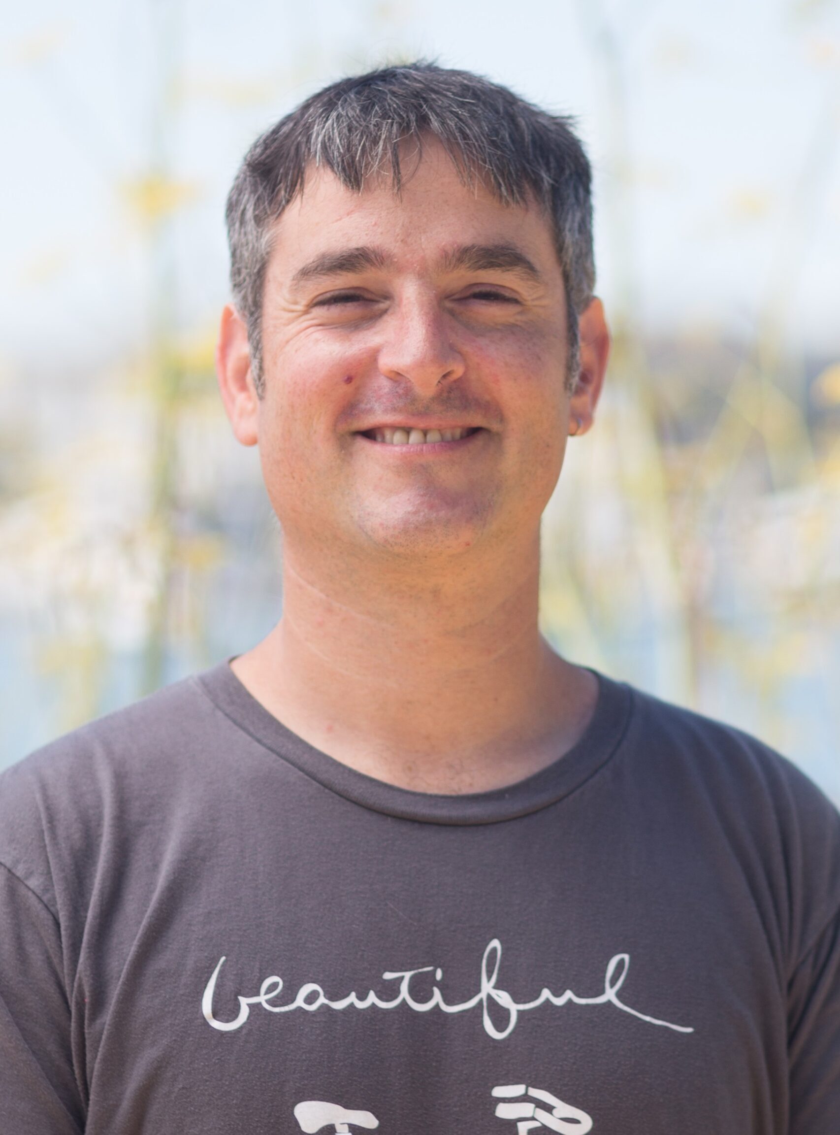 A close-up portrait of Bike East Bay staff member