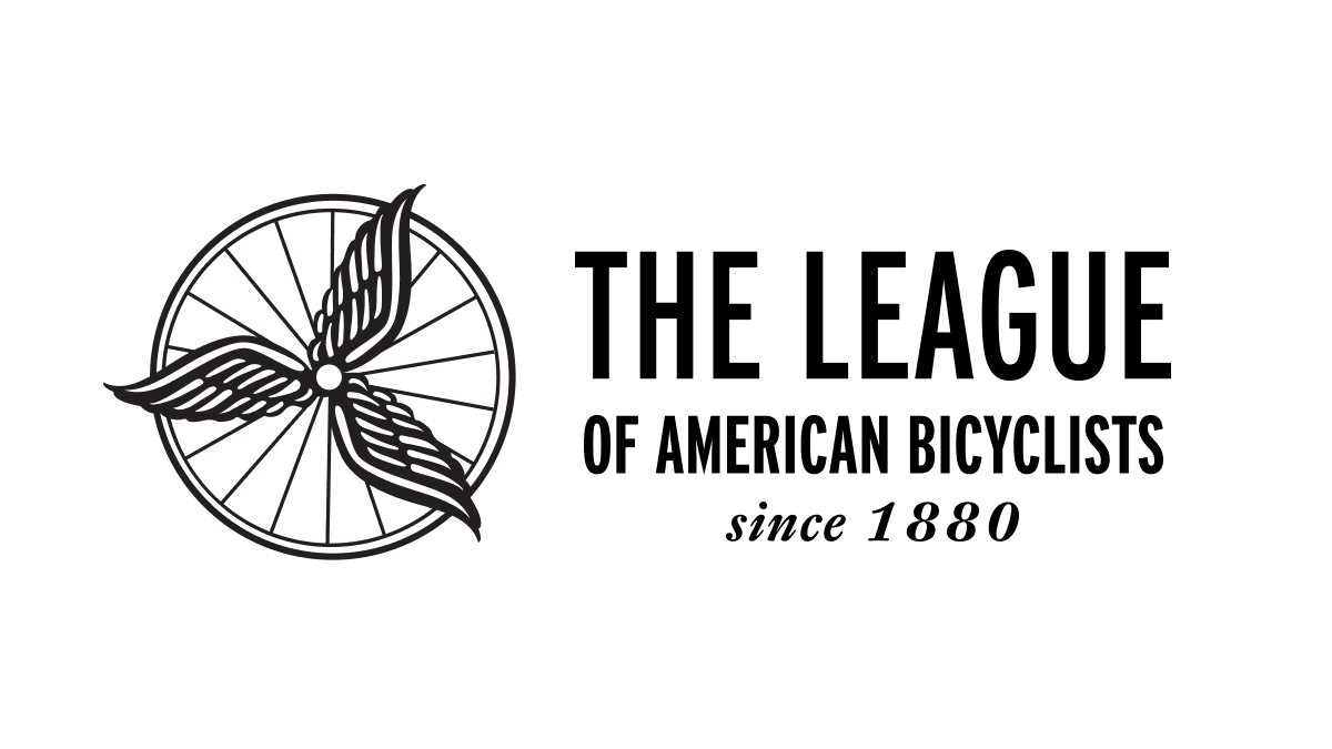 Logo for The League of American Bicyclists. On the left is a black-and-white graphic featuring a bicycle wheel with three stylized, feathered wings radiating from the center hub. To the right, the text reads "THE LEAGUE" in a large, bold, sans-serif font. Below it, in a slightly smaller weight, are the words "OF AMERICAN BICYCLISTS." At the bottom, the phrase "since 1880" is written in a smaller, elegant serif italics. The entire logo is set against a clean white background.