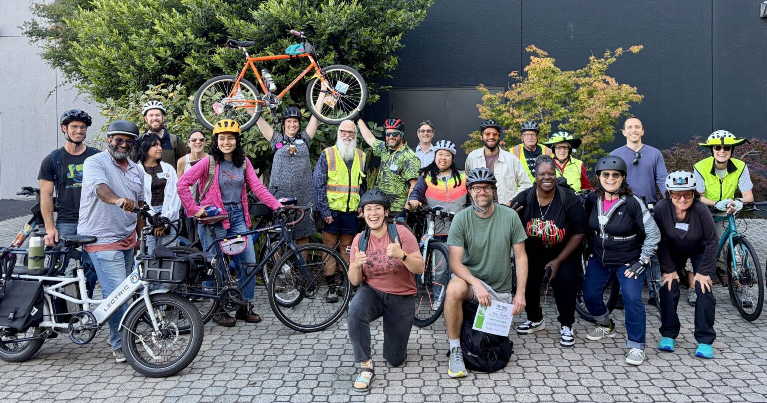 Pre-ride group photo of attendees of the 2026 League Cycling Workshop that took place in Oakland at the Bike East Bay office.